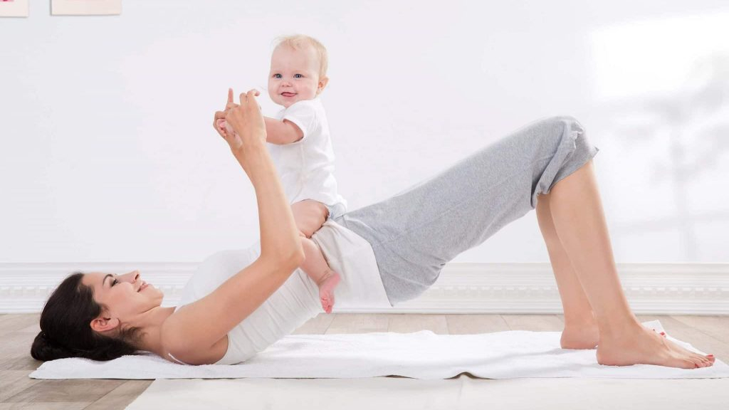 Woman carrying baby
